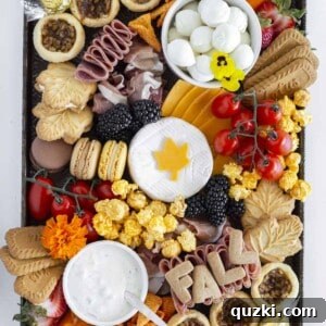 A fall charcuterie board on a galvanized tray.