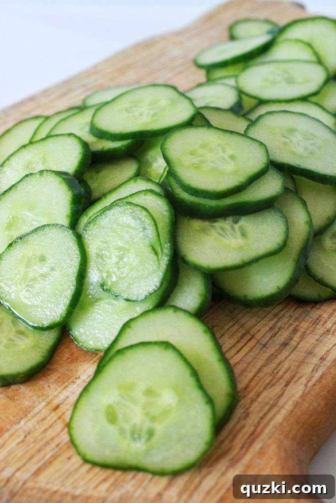Thinly sliced English cucumber, ready for the refreshing salad.