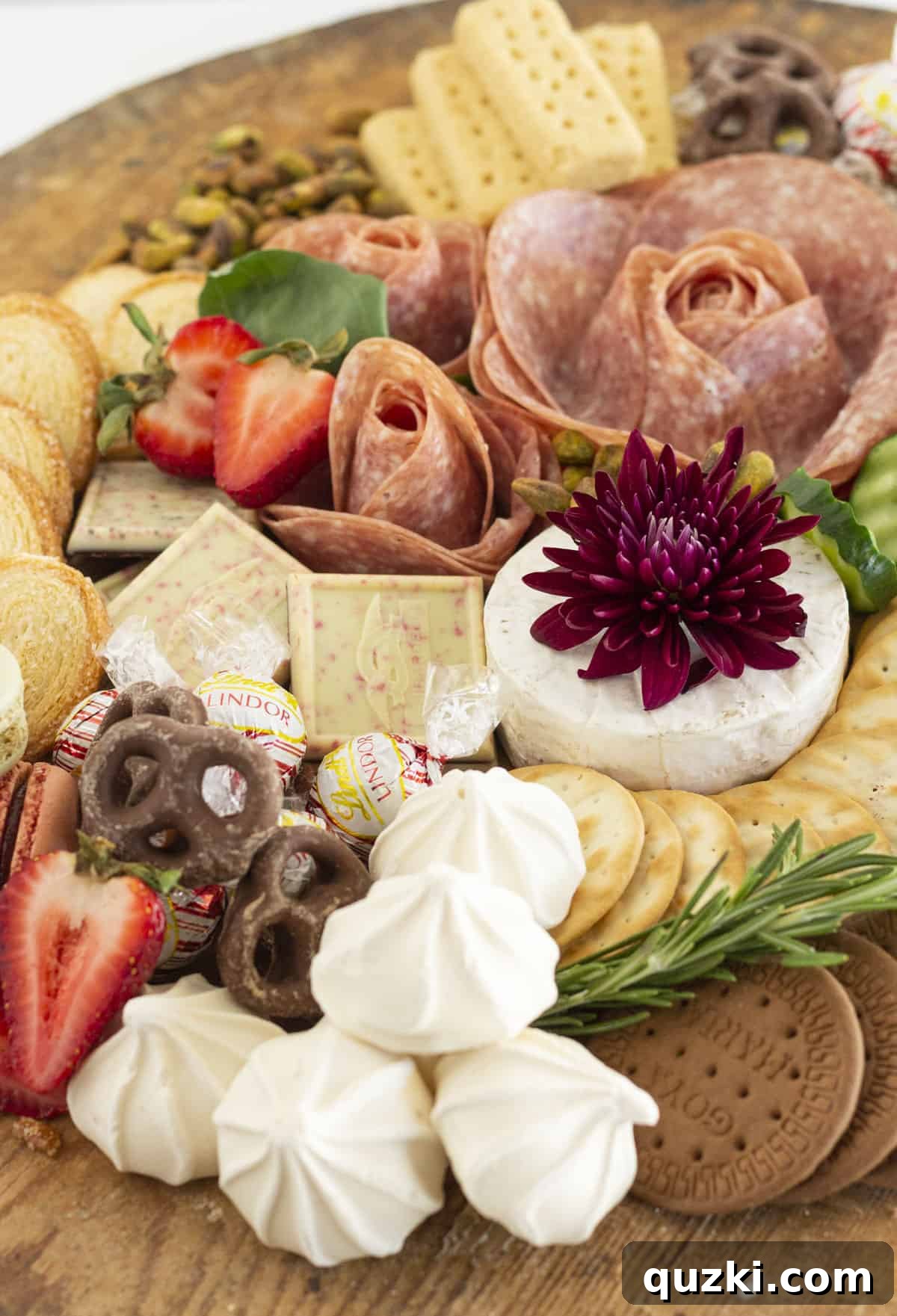 Crafting the Ultimate Christmas Charcuterie Board 5 A close up of a Christmas charcuterie board with seasonal ingredients and festive decor.
