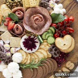 A finished Christmas charcuterie board that is festive and ready to serve.