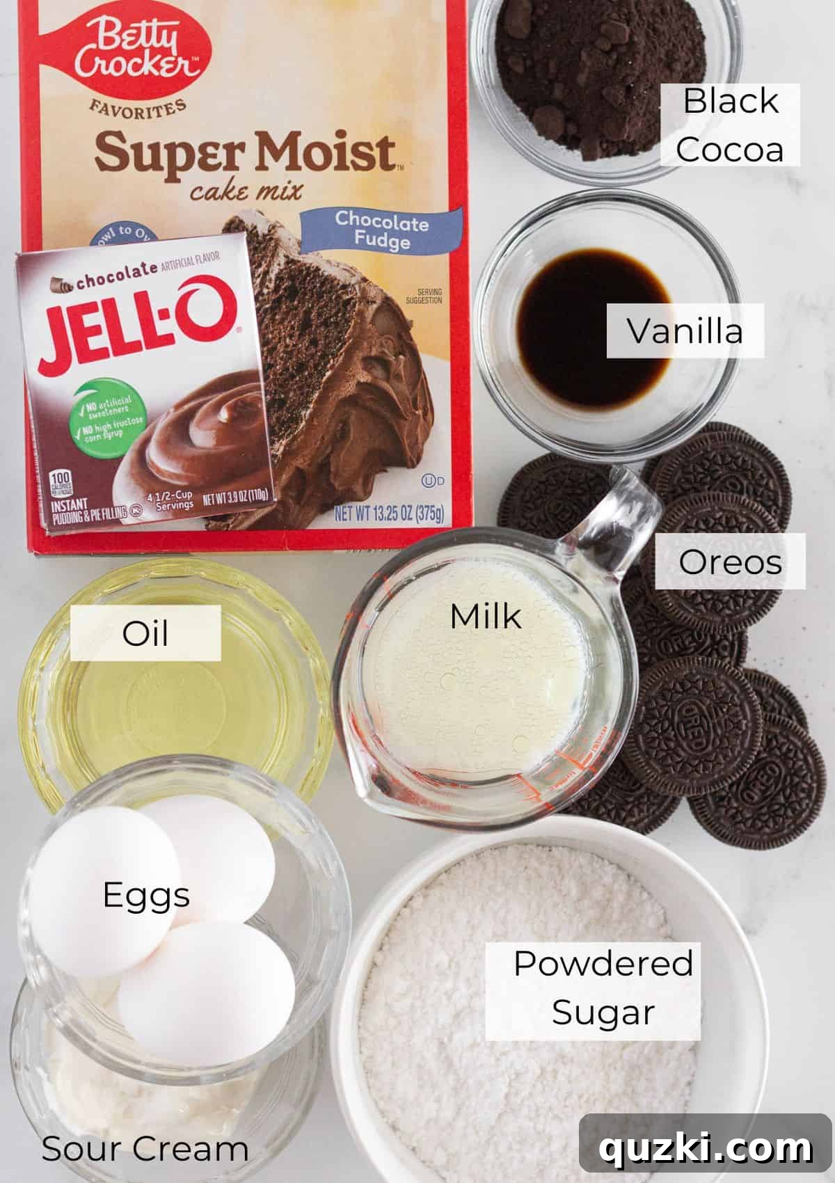 All the essential ingredients for making an Easy Oreo Bundt Cake, neatly arranged and ready for baking.