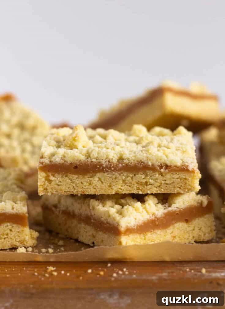 Salted Caramel Butter Bars made with a Cake Mix, featuring a golden crust and caramel drizzle.