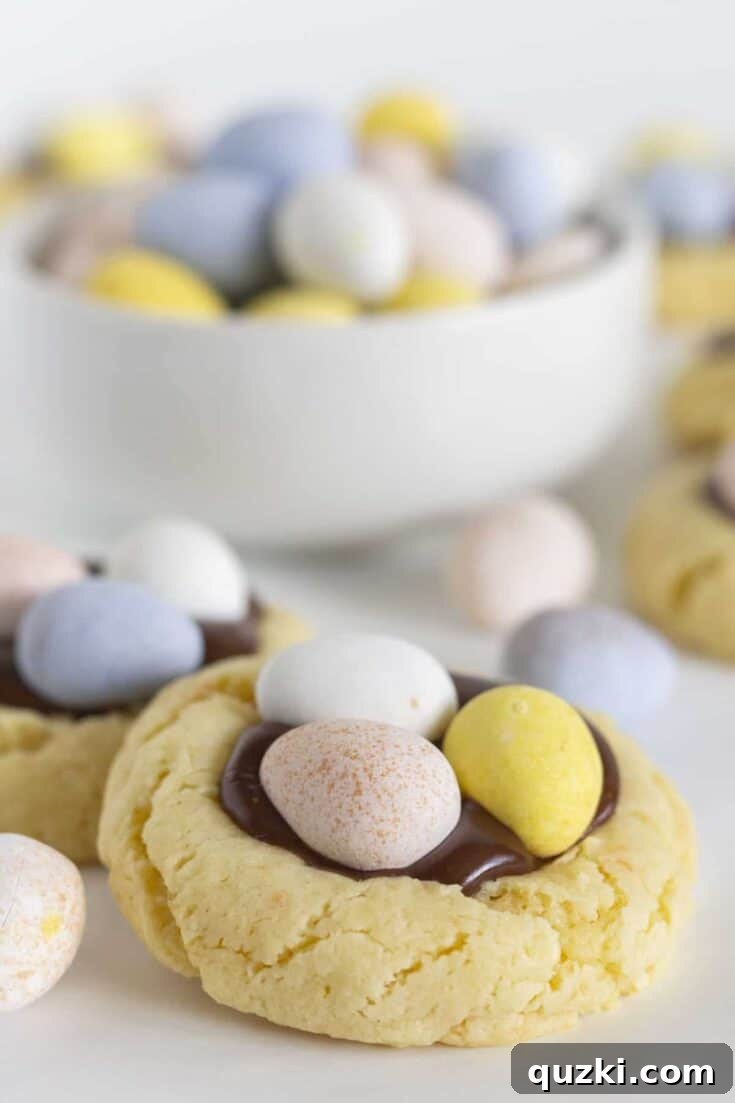 Easy Cadbury Mini Egg Cookies, colorful thumbprint cookies with chocolate ganache.