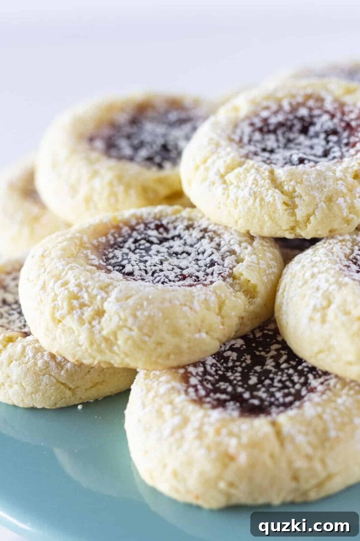 Yellow Cake Mix Thumbprint Cookies filled with vibrant jam.