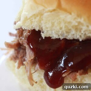 Crock Pot Pulled Pork Recipe featured by top US food blog, Practically Homemade