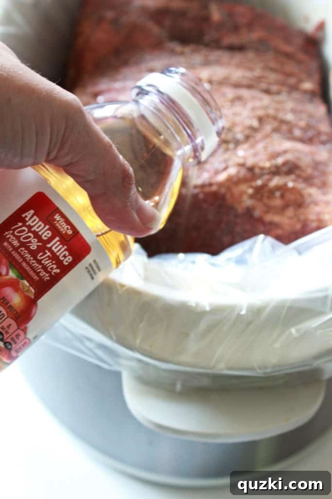Crock Pot Pulled Pork Recipe featured by top US food blog, Practically Homemade