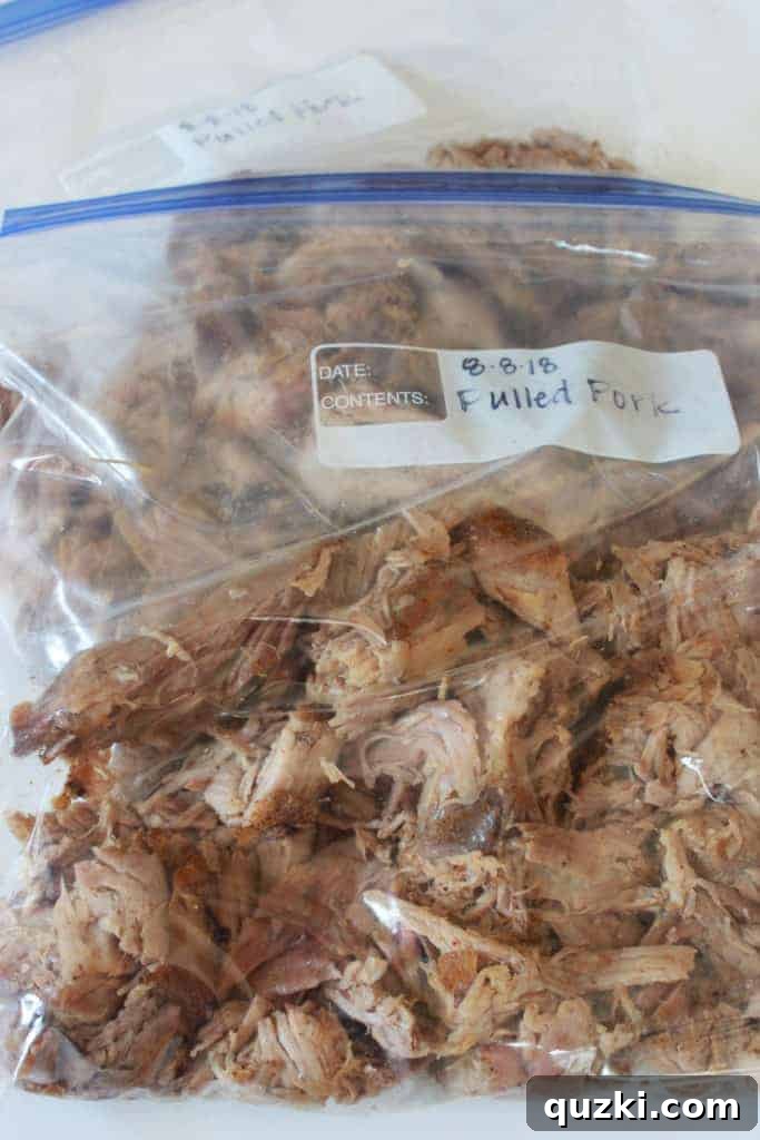 Crock Pot Pulled Pork Recipe featured by top US food blog, Practically Homemade