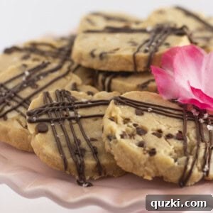 Hawaiian Shortbread Cookies on a pink cake plate.