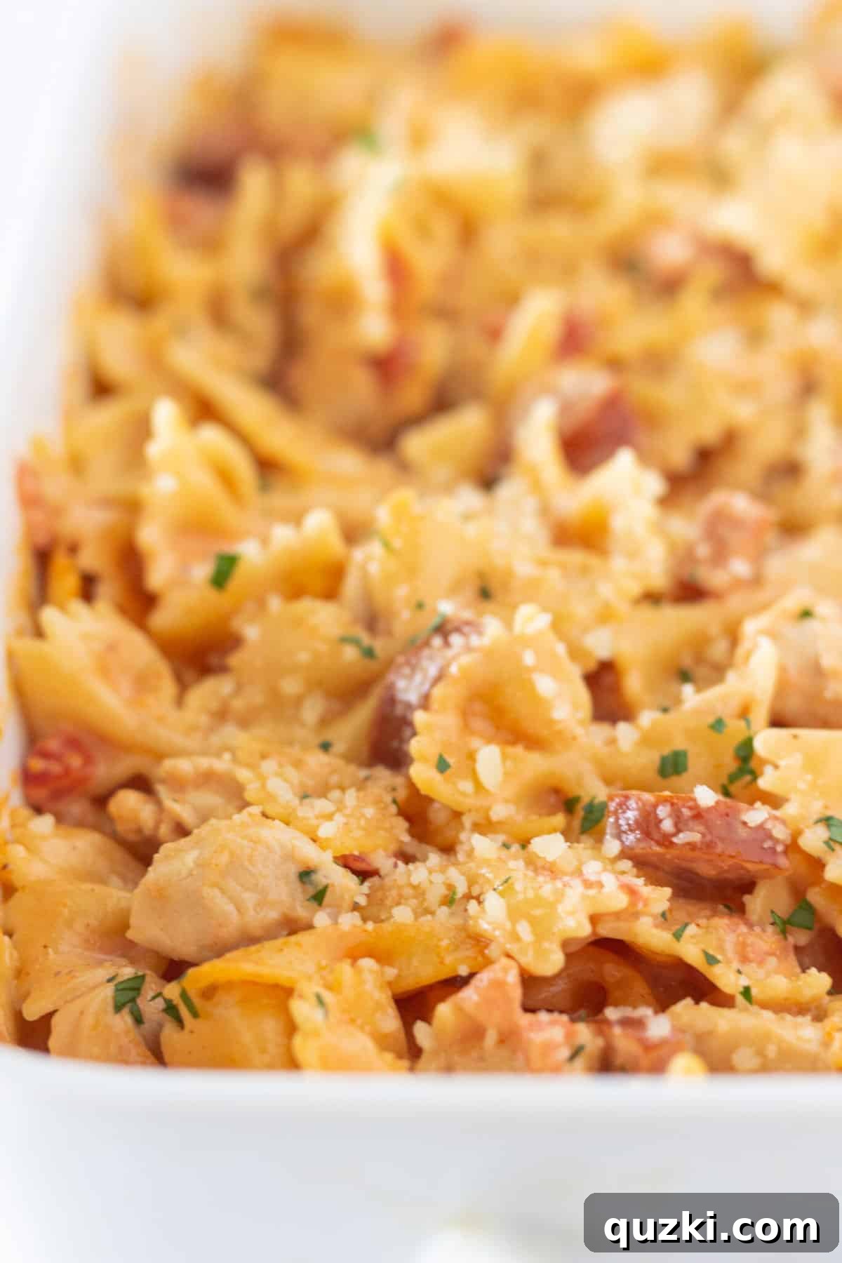10 Cozy Fall Casseroles to Warm Your Soul 3 Creamy Cajun Chicken Pasta Casserole baking in a dish, a perfect fall comfort meal.