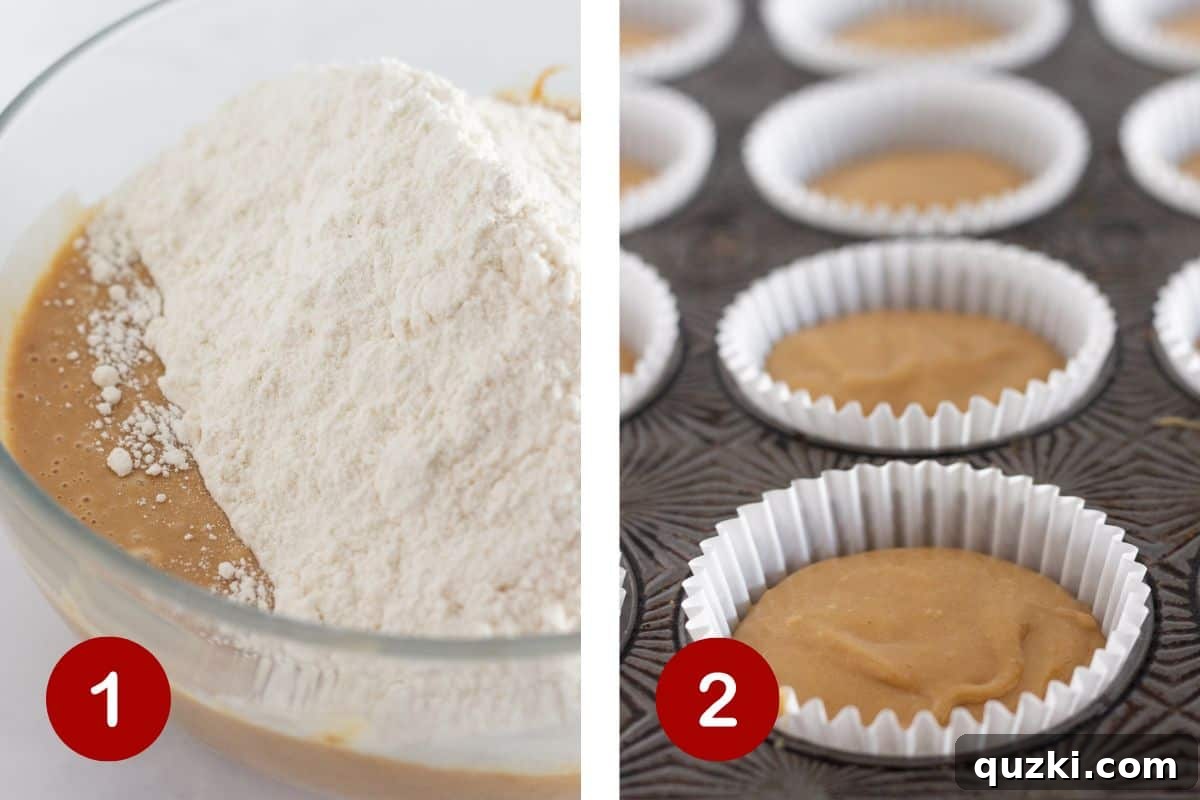 The process of mixing cupcake batter in a bowl and neatly filling muffin cups with the batter.
