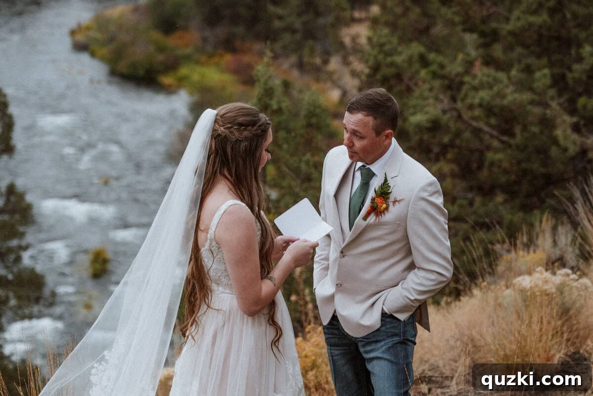 Taylea and Jordan sharing a private, emotional exchange of vows, overlooking a scenic river, a deeply personal moment captured after their public ceremony.