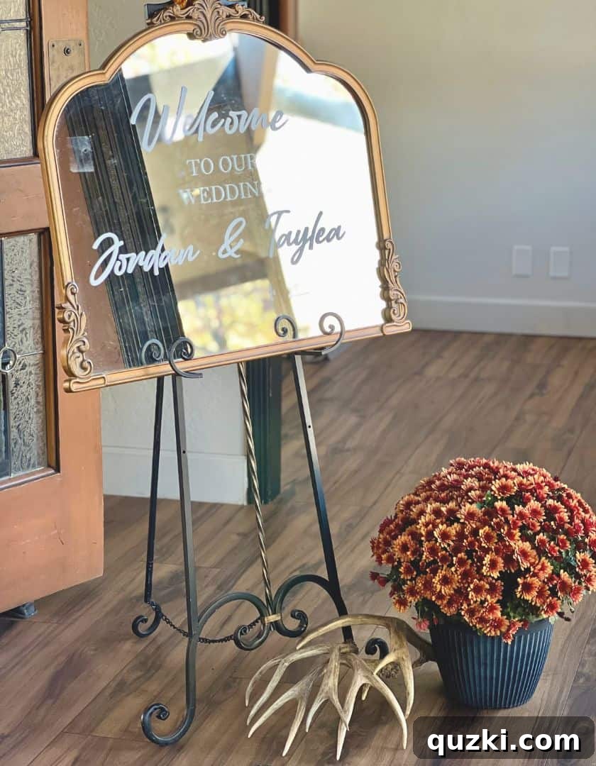 A beautifully crafted welcome mirror, personalized by the bride, positioned at the wedding entrance to greet guests with a warm and inviting message.