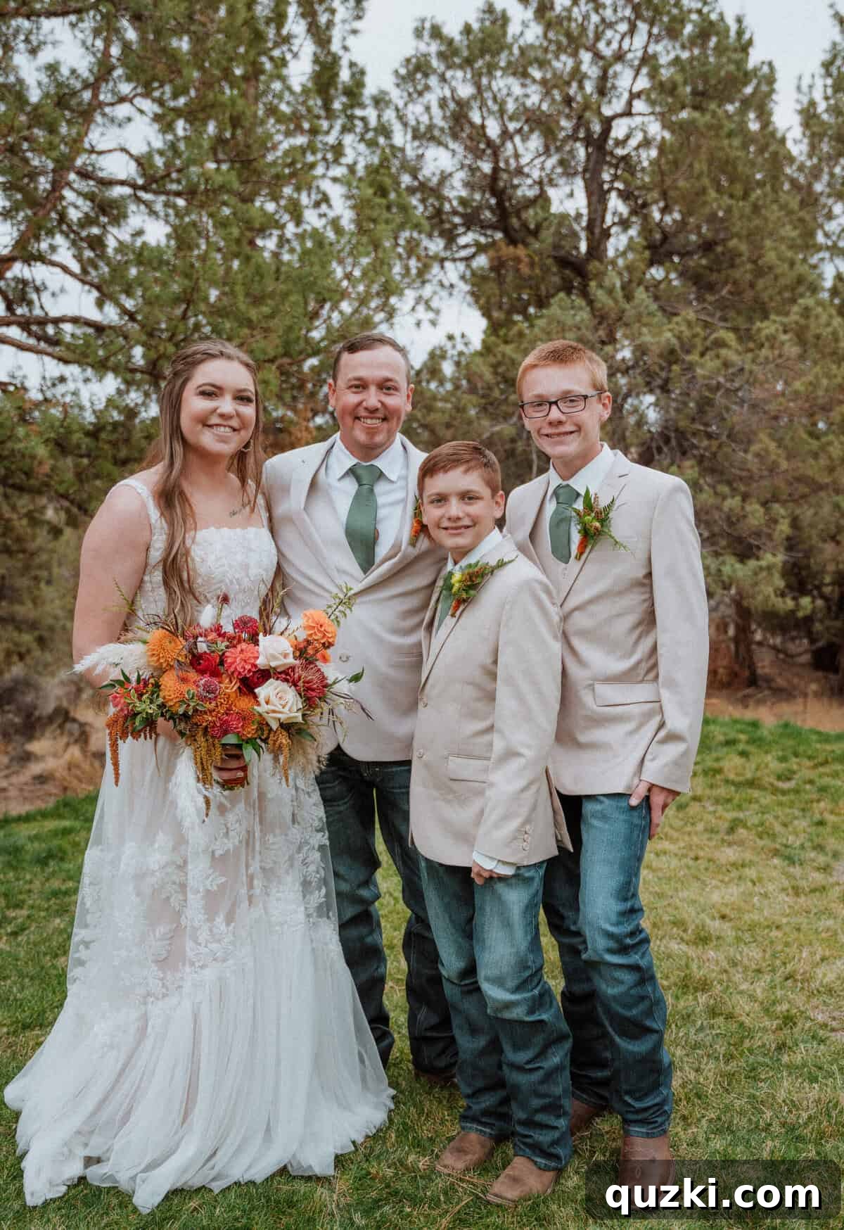 The newly formed family: the bride and groom, Taylea and Jordan, happily posing with Jordan's sons, symbolizing their blended family and shared future.