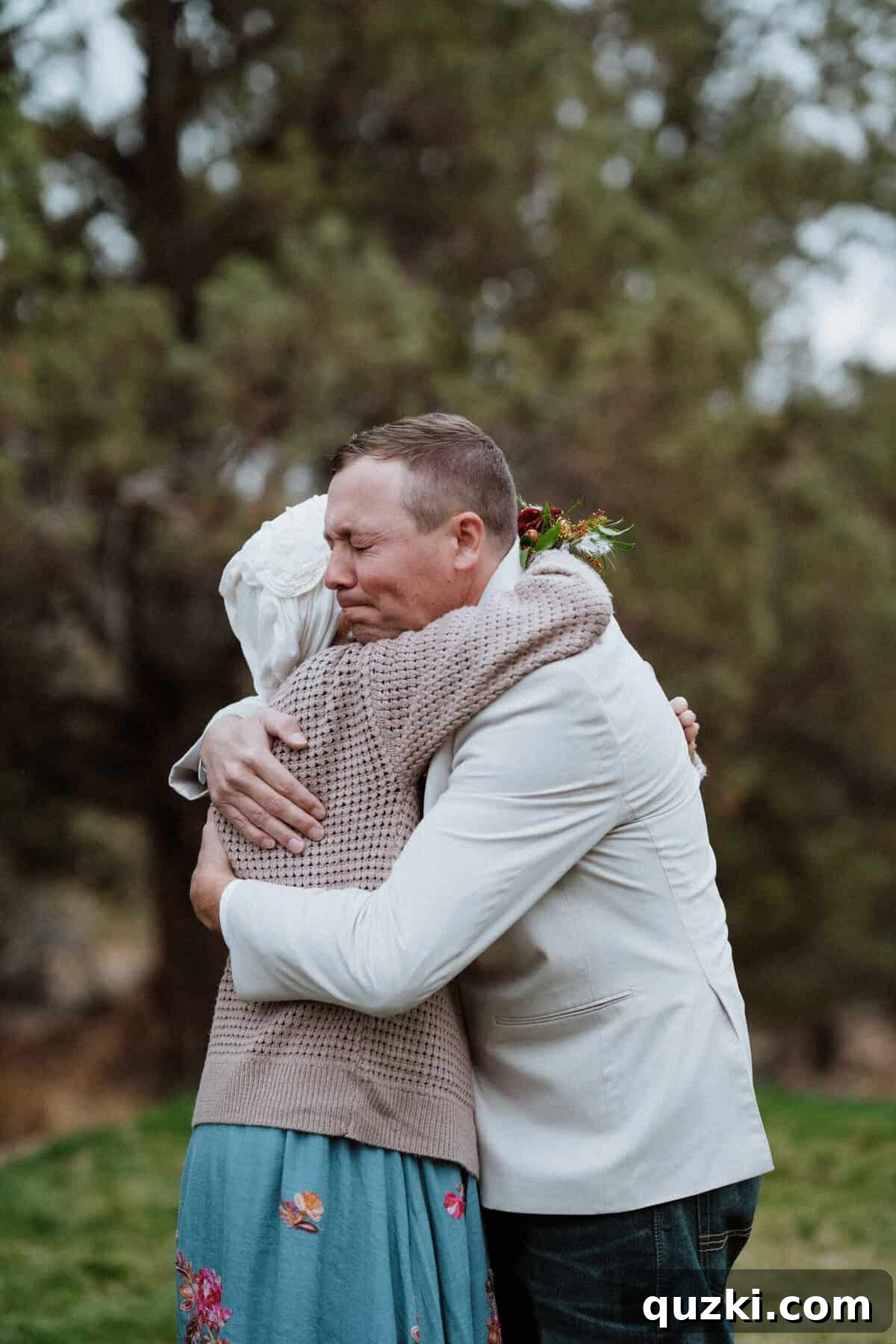A heartwarming photo of the groom, Jordan, sharing a tender embrace with his mother, showcasing their special bond and love.