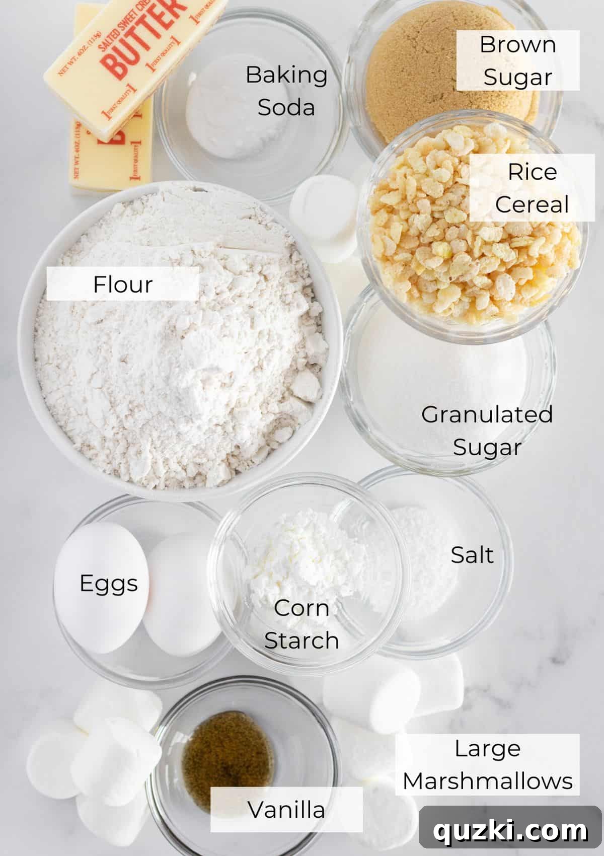 Ultimate Rice Krispie Cookies 3 A curated display of all the essential ingredients laid out on a clean surface, ready for making Rice Krispie Cookies, including butter, sugars, eggs, vanilla, flour, and cereal.