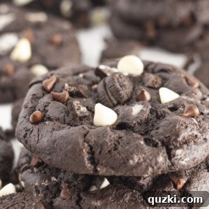 Stacks of chocolate cookies and cream cookies.