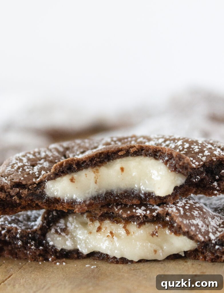 Cake Mix Cookie Magic: Decadent Chocolate Treats 22 A chocolate cake mix cookie generously stuffed with creamy cream cheese frosting, creating a delightful surprise.