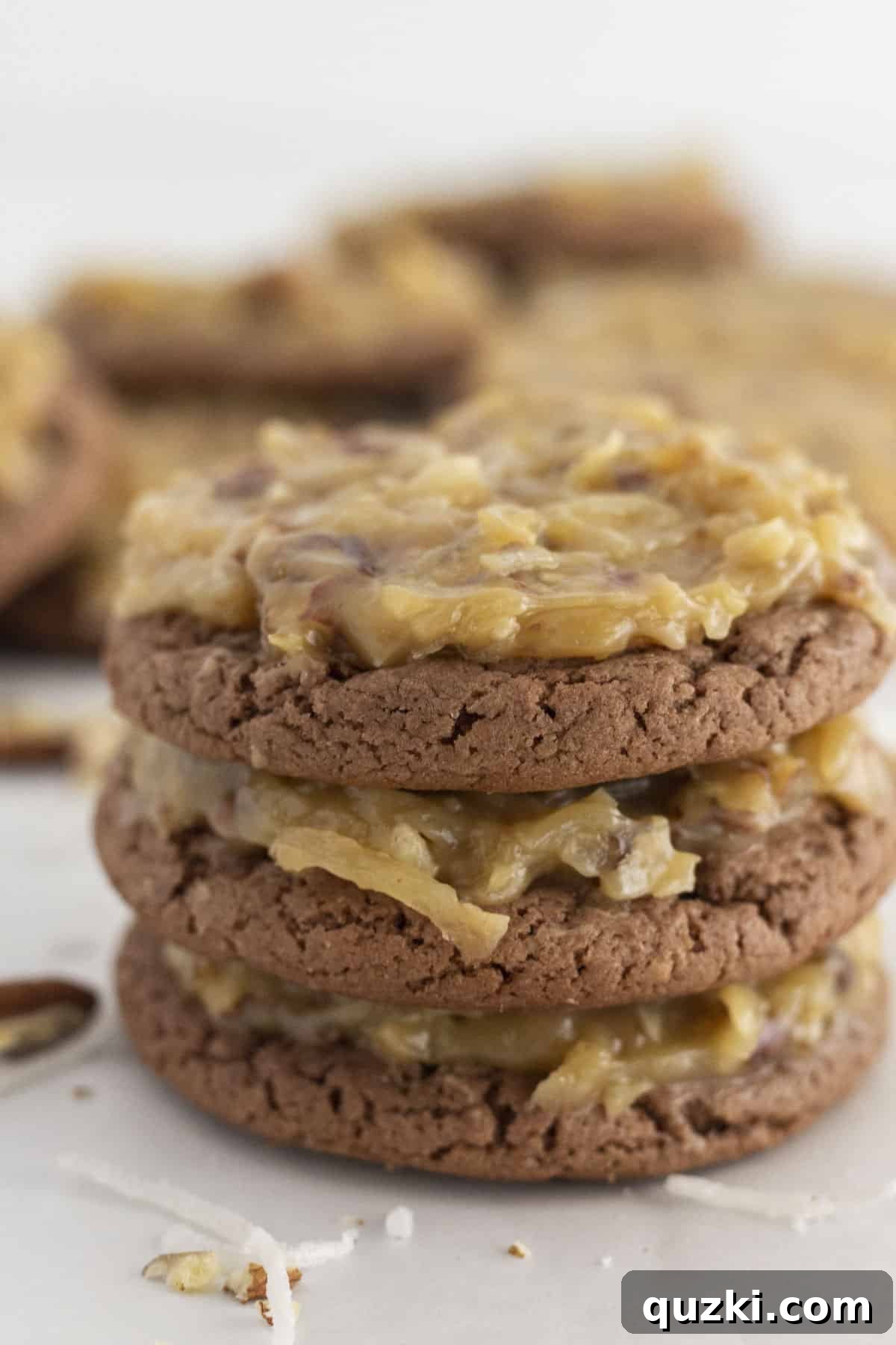 Cake Mix Cookie Magic: Decadent Chocolate Treats 6 Stacked German Chocolate Cake Mix Cookies, showcasing their rich chocolate base and iconic coconut-pecan frosting.