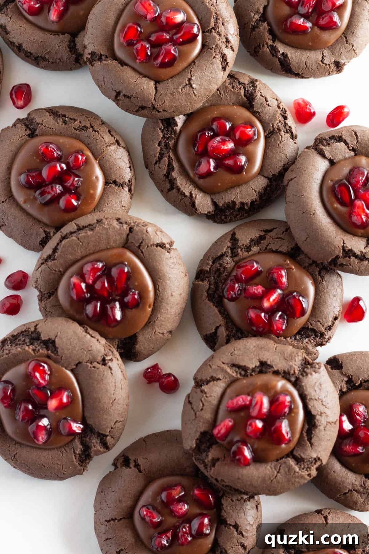 Cake Mix Cookie Magic: Decadent Chocolate Treats 9 Festive Chocolate Pomegranate Cookies on a tray, adorned with fresh, juicy pomegranate seeds, ideal for the holiday season.