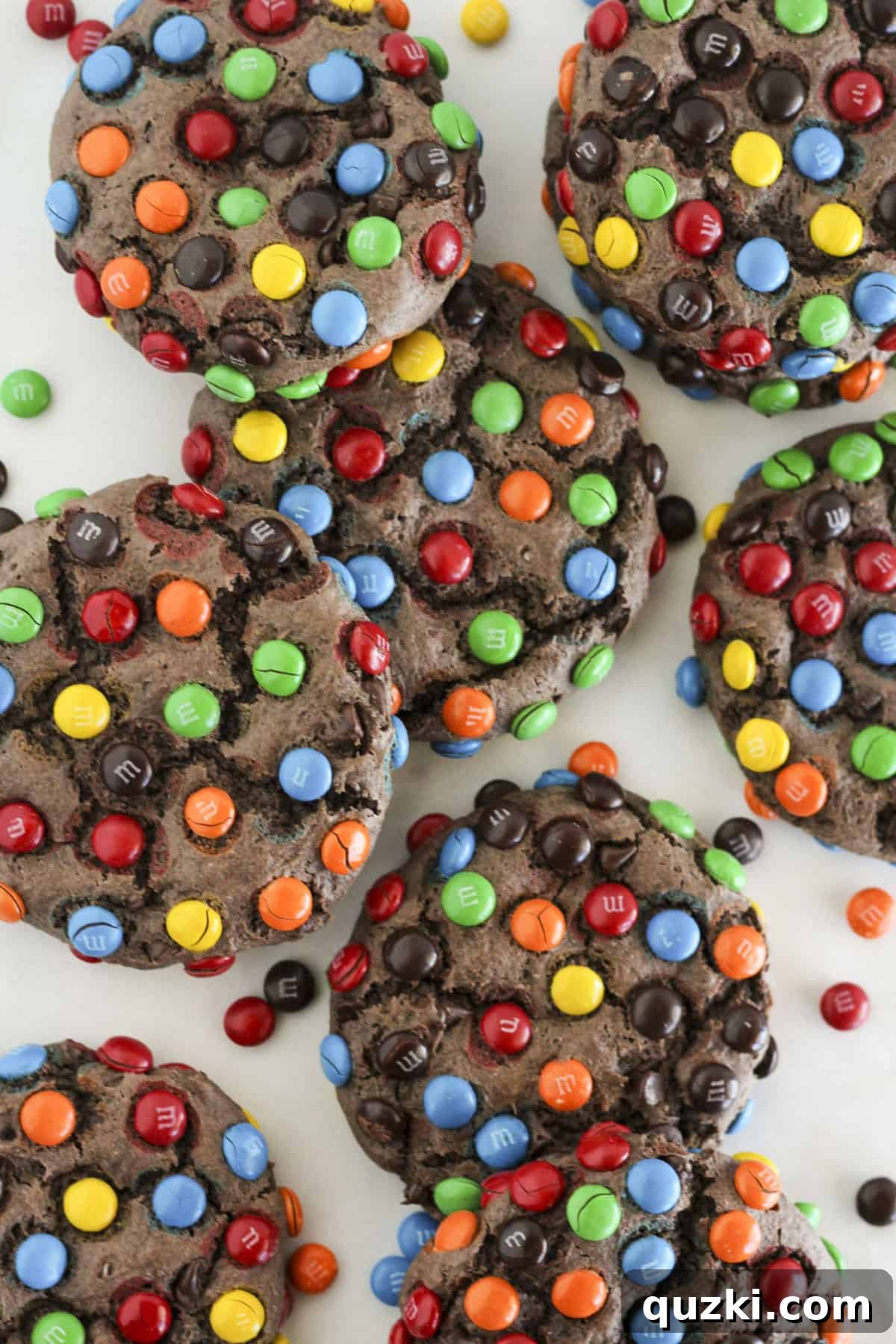 Cake Mix Cookie Magic: Decadent Chocolate Treats 10 Eight vibrant chocolate cake mix M&M cookies, colorful and inviting, arranged on a plate ready for serving.
