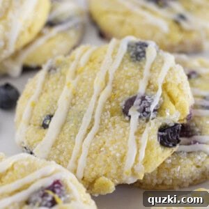 Lemon blueberry cake mix cookies with lemon glaze, presented beautifully in a round image frame.