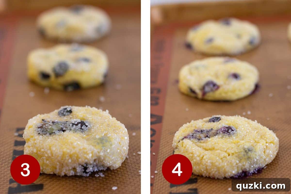 Freshly baked lemon blueberry cookies cooling on a wire rack, ready for the final lemon glaze drizzle.