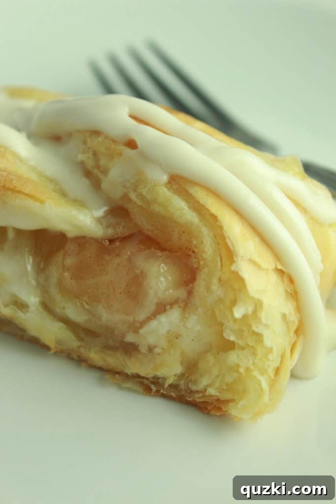 Sweet Apple Cream Cheese Braid 7 Fully braided puff pastry on a baking sheet, ready for the oven.