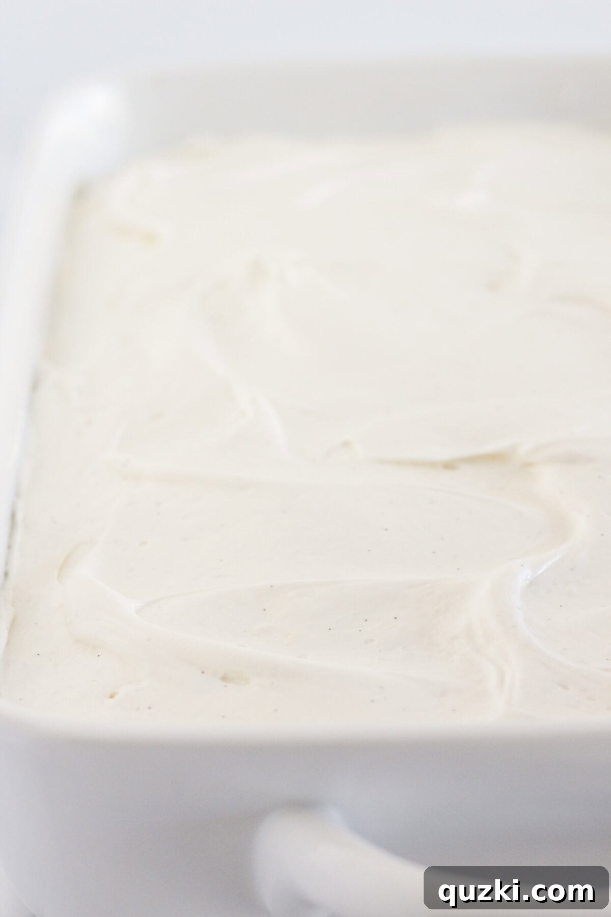 Perfect Vanilla Sheet Cake 8 Frosting the completely cooled vanilla sheet cake with cream cheese frosting.