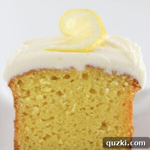 A loaf of lemon bread with frosting on top.