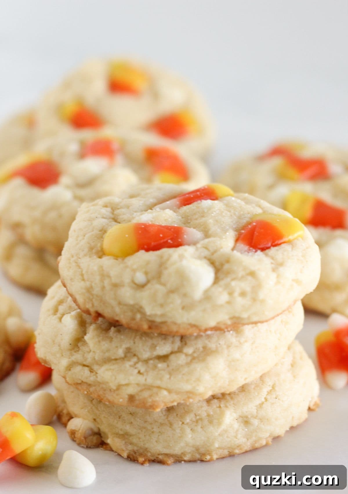 A stack of festive Candy Corn Sugar Cookies, ready for Halloween, showcasing their distinctive colors.