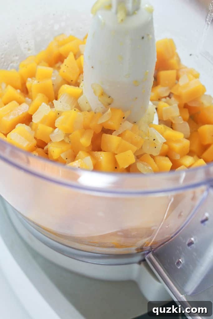Golden Butternut Parmesan Pasta 5 Blended butternut squash sauce, creamy and vibrant, poured into a blender with milk or heavy cream.