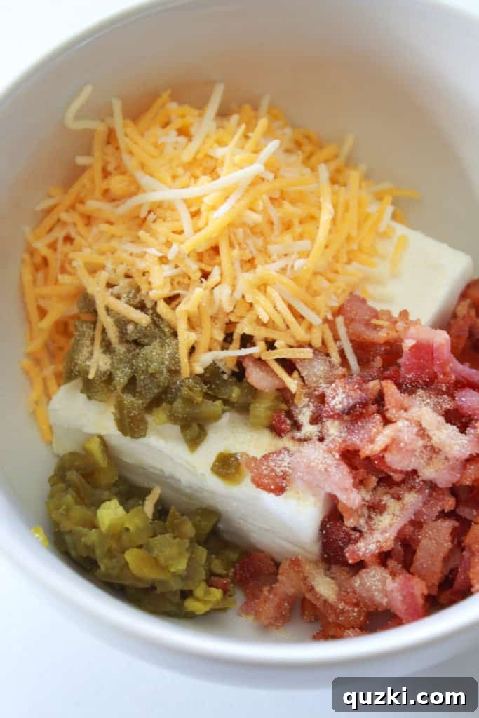 Spicy Jalapeño Crescent Poppers 4 Mixing cream cheese, bacon, jalapenos, and cheddar cheese for the creamy filling of Jalapeno Popper Crescent Bites.
