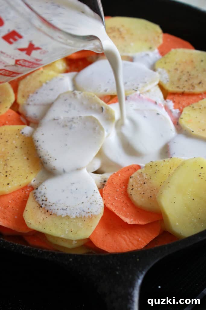 Creamy Sweet and Yukon Gold Potato Skillet Gratin 7 Sweet and Yukon Gold potato au gratin covered with foil, ready for oven baking