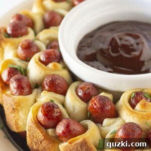 A beautifully baked Pigs in a Blanket Wreath, ready to be served as an appetizer.