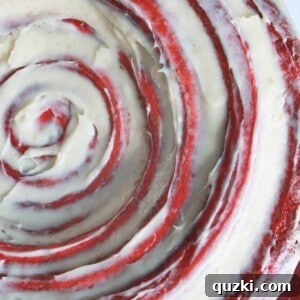 Red Velvet Cinnamon Roll Cake with cream cheese frosting, featured in the recipe card.