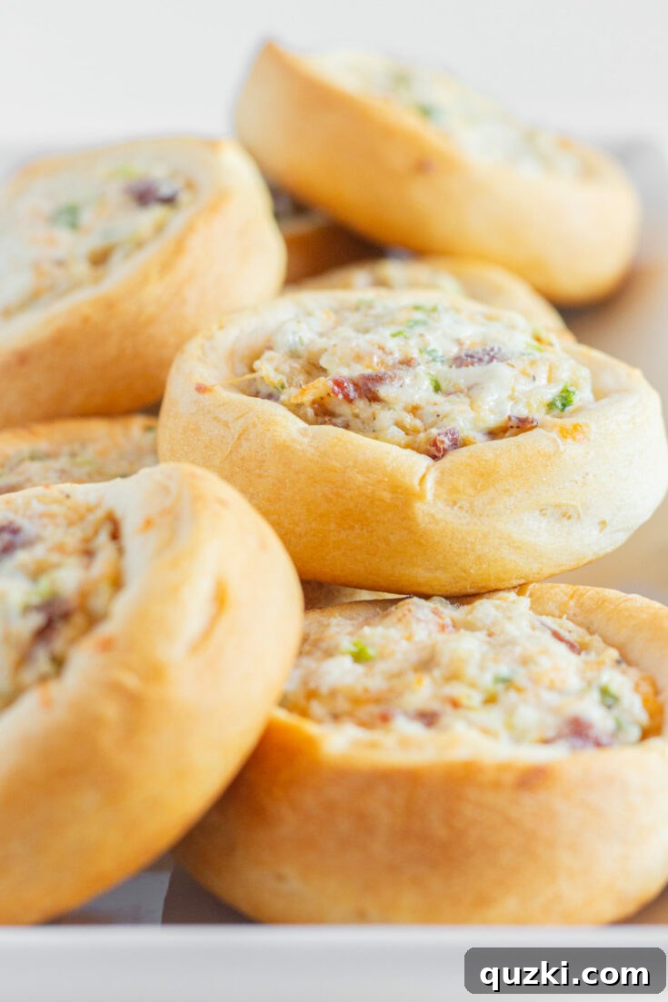 Perfectly baked Easy Chicken Cream Cheese Crescent Rolls, featuring a creamy and savory chicken and cream cheese filling encased in golden crescent dough.