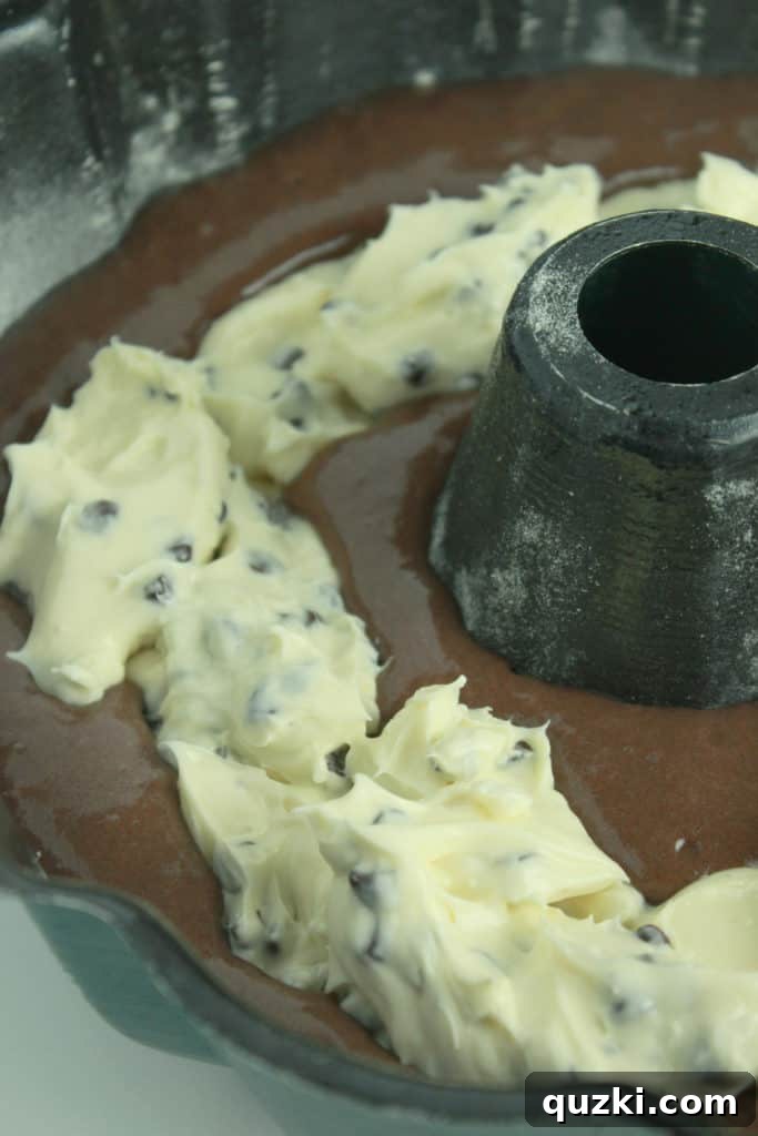 Decadent Black Bottom Bundt Cake 5 Carefully layering chocolate cake batter and cream cheese filling in a Bundt pan for a perfectly structured Black Bottom Bundt Cake