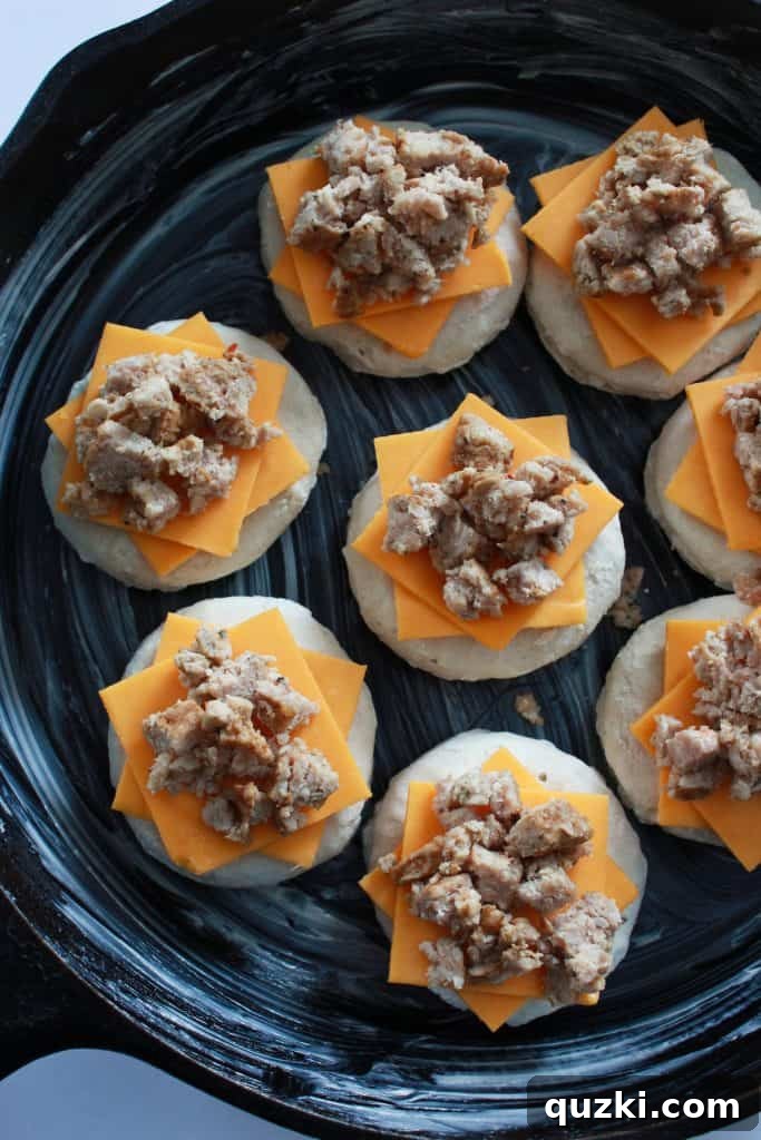 Chopped cooked sausage piled high onto the cheddar-topped biscuits.