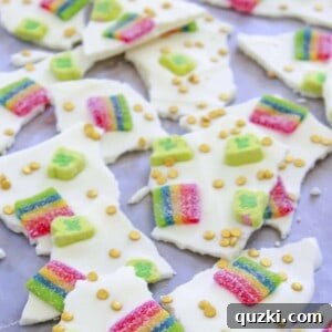 Beautifully broken pieces of Leprechaun Bark displayed on a baking tray, showcasing its vibrant colors and inviting texture.