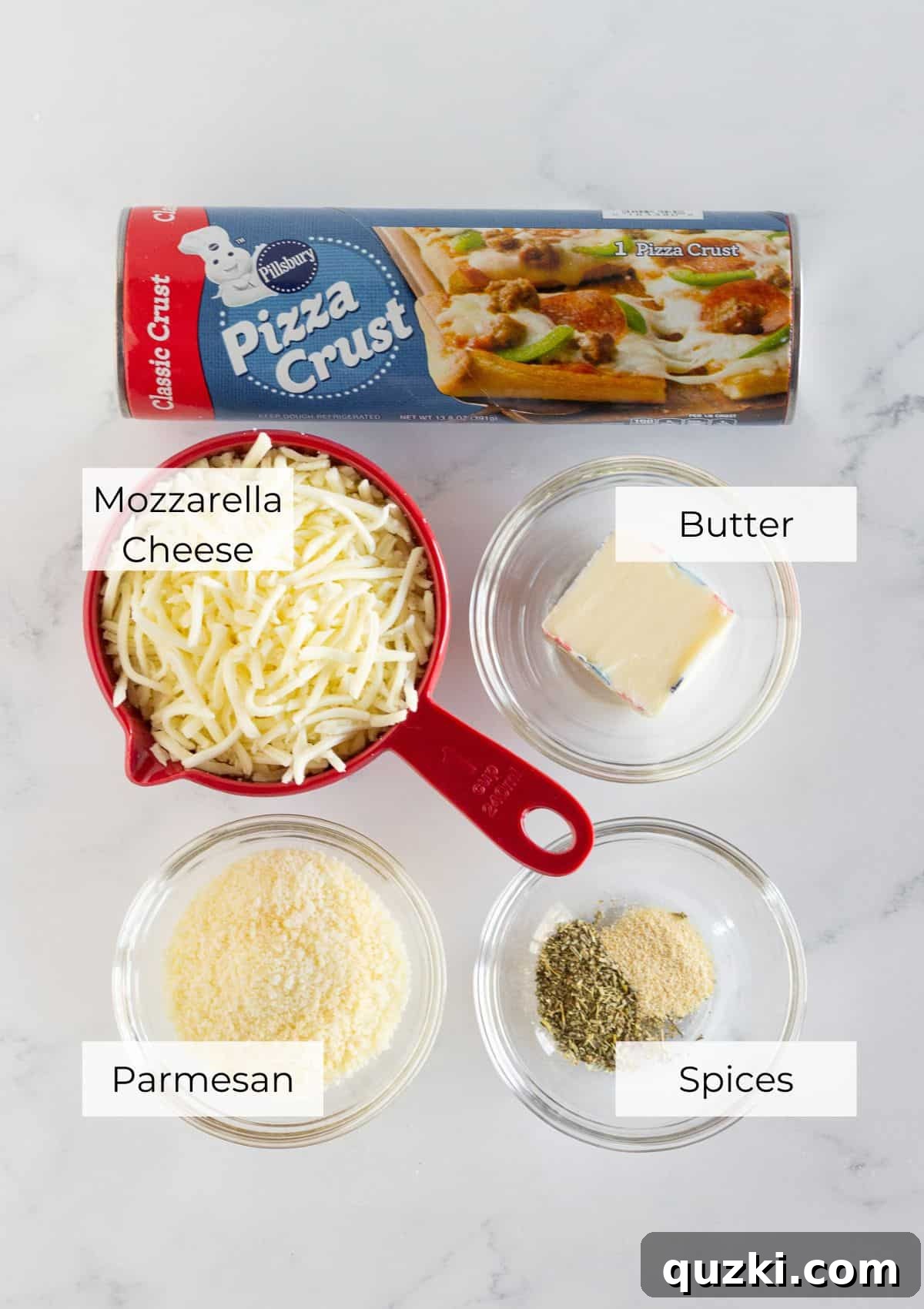 Melt-in-Your-Mouth Cheese Sticks 3 All the ingredients neatly laid out on a kitchen counter, ready to make Cheesy Breadsticks.