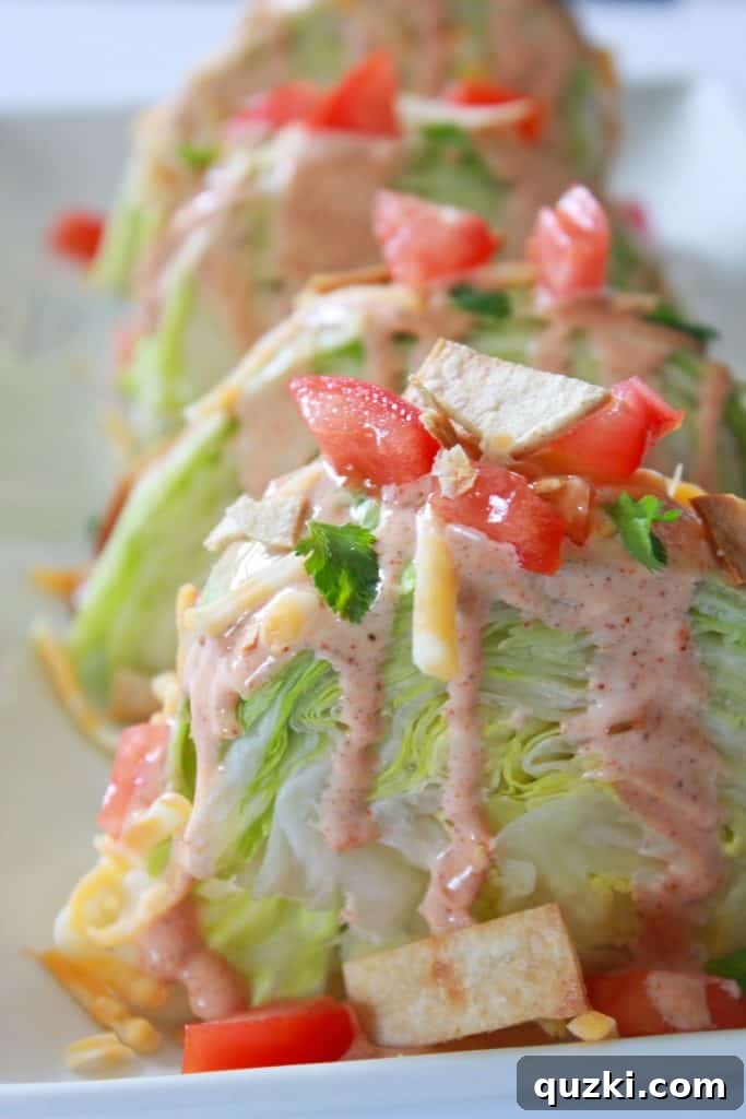 Vibrant Fiesta Wedge Salad 10 Crunchy tortilla strips generously topping a Fiesta Wedge Salad, providing a satisfying texture and classic corn flavor.
