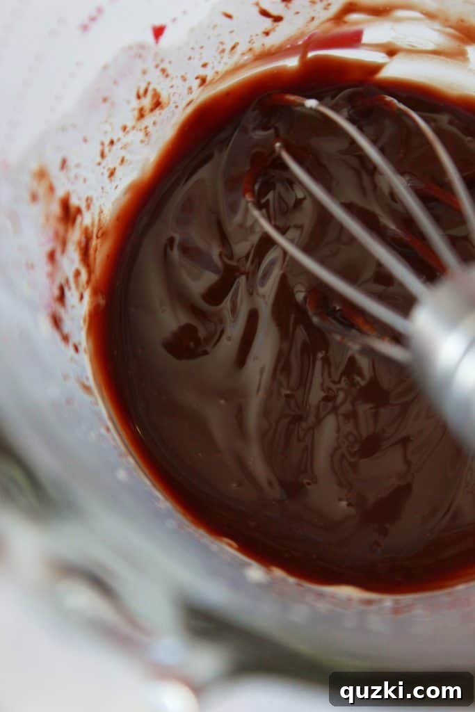 Effortless Boston Cream Pie Cookie Treats 14 Whisking melted chocolate and cream for smooth ganache