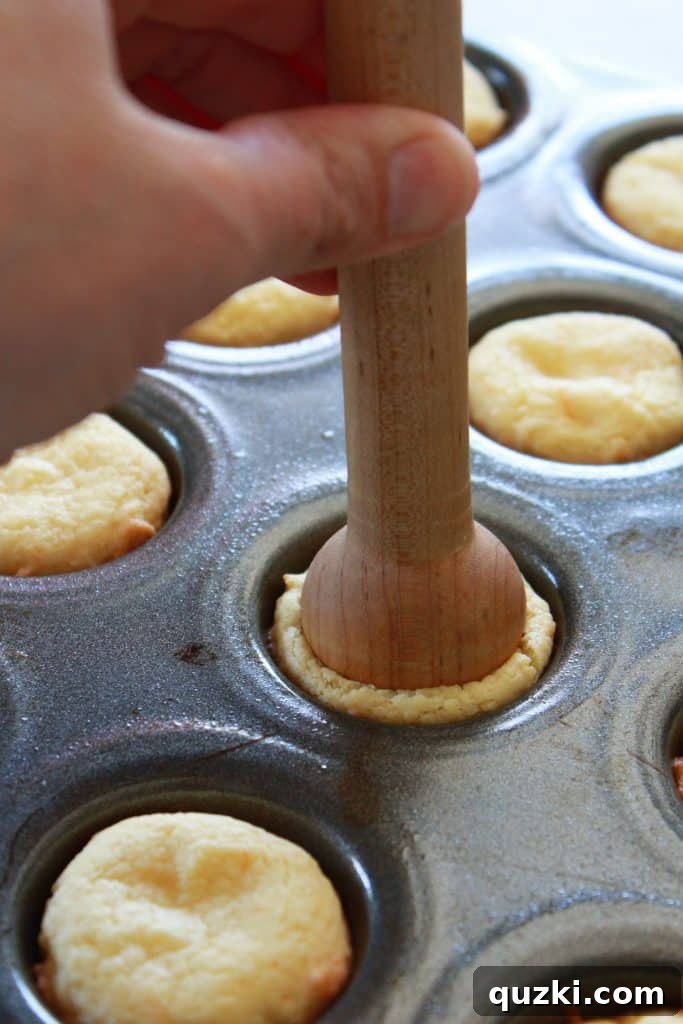 Effortless Boston Cream Pie Cookie Treats 8 Pressing indentations into warm cookie cups with a tart shaper