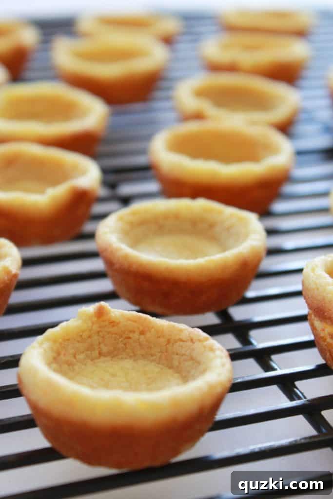 Effortless Boston Cream Pie Cookie Treats 9 Cooled cookie cups ready for filling