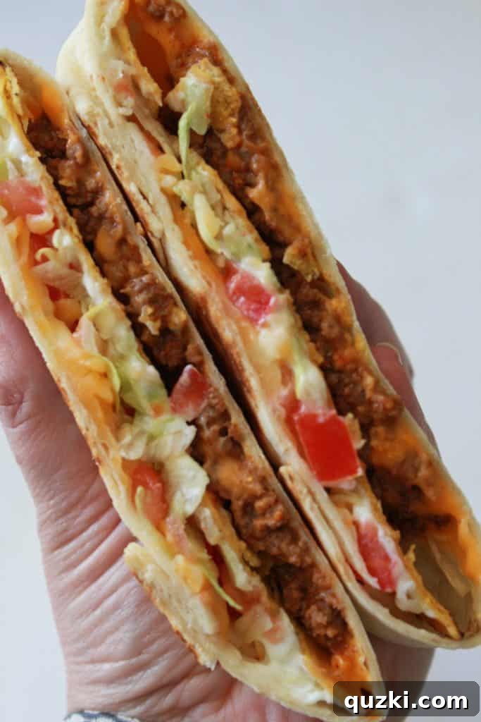 Golden Crunch Pocket 2 Homemade Crunchy Wrap Supreme - a delicious Taco Bell copycat recipe made easily at home with ground beef, nacho cheese, and a crispy tostada shell.
