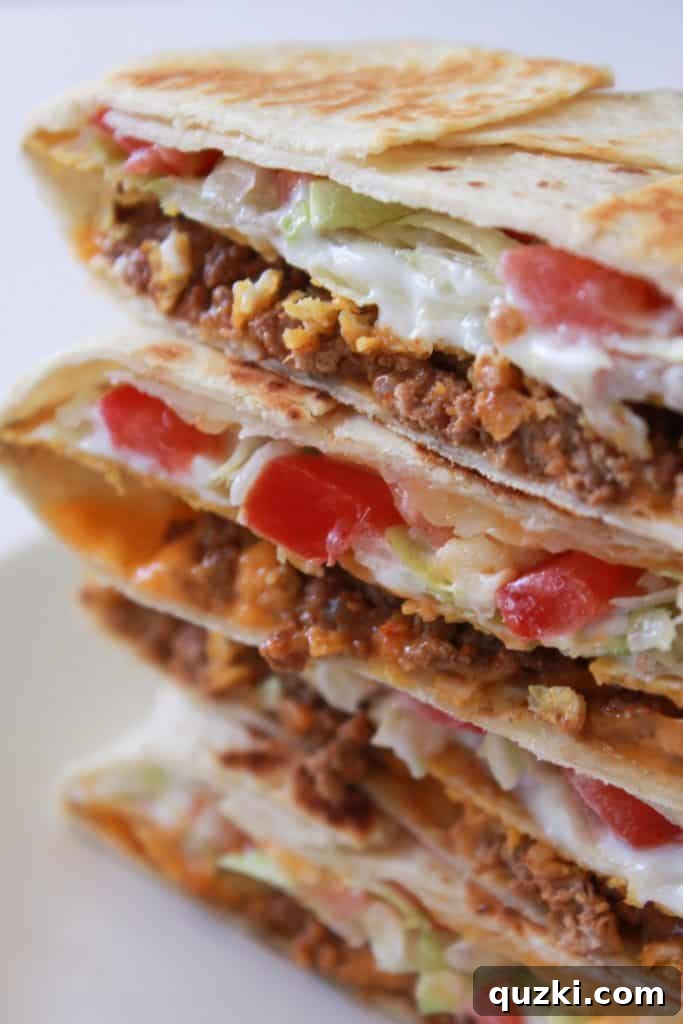 Golden Crunch Pocket 14 A stack of freshly made Homemade Crunchy Wraps, ready to be served.