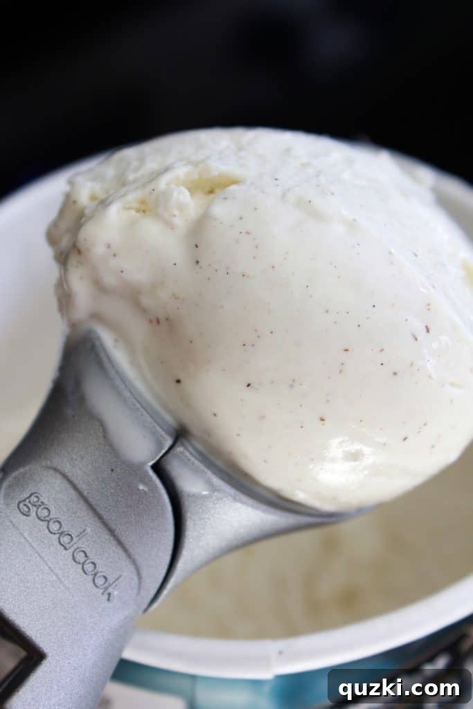 Decadent Skillet Chocolate Chip Cookie 12 Unusual-looking, ergonomic ice cream scoop held in hand
