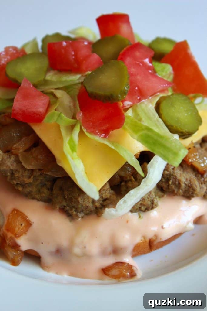 Fresh lettuce, tomato, and pickles added to the sloppy joe