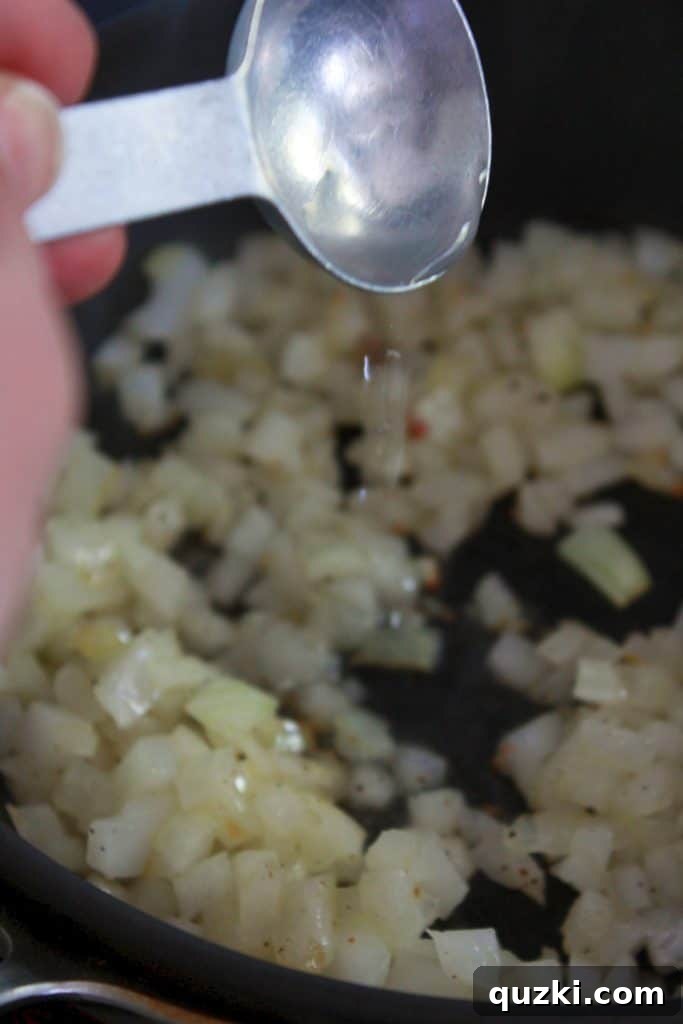 Process of steaming onions by adding small amounts of water