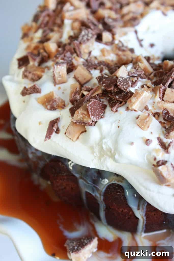 Better Than Anything Bundt Cake with caramel, Heath bar, and whipped cream